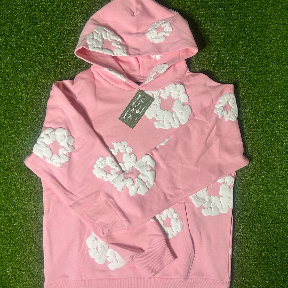 Pink Denim Tears Hoodie with White Floral Design